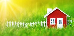 red wooden house on the grass red wooden house on the grass